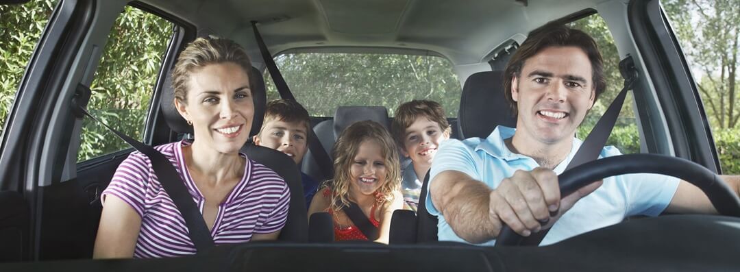 Família no carro em Miami